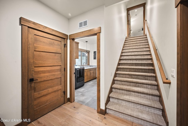 1230 E Amulet Cir, Rathdrum, ID 83858 - stairs featuring wood finished floors