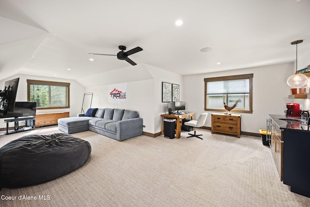 1230 E Amulet Cir, Rathdrum, ID 83858 - living room featuring baseboards, lofted ceiling, light carpet, recessed lighting, and a ceiling fan