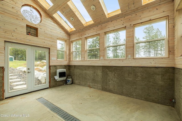 27464 N Timber Ridge Rd, Rathdrum, ID 83858 - unfurnished sunroom featuring french doors, heating unit, plenty of natural light, a skylight, and lofted ceiling