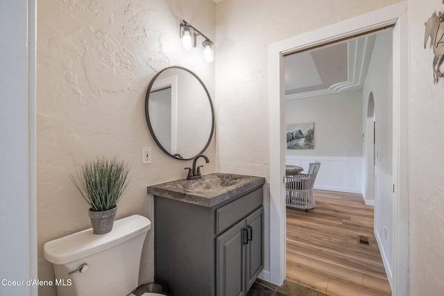 27464 N Timber Ridge Rd, Rathdrum, ID 83858 - bathroom featuring vanity, toilet, and wood finished floors