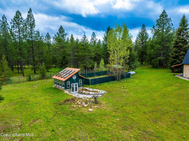 27464 N Timber Ridge Rd, Rathdrum, ID 83858 - view of yard featuring french doors