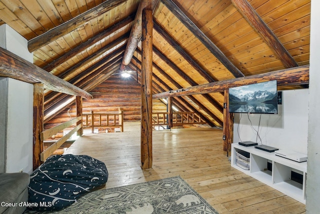 attic featuring an upstairs landing