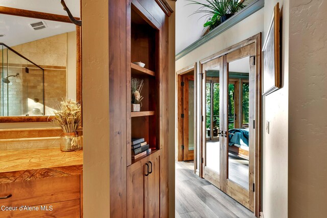 7177 W Heine Rd, Coeur Dalene, ID 83814 - doorway with light wood-type flooring