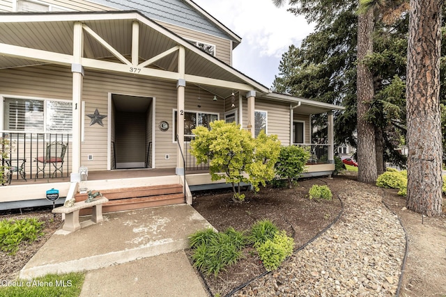 377 E Knotty Pine Ln Unit 2, Coeur Dalene, ID 83815 - entrance to property featuring covered porch