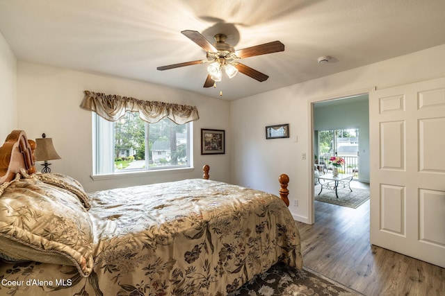 377 E Knotty Pine Ln Unit 2, Coeur Dalene, ID 83815 - bedroom featuring light wood-type flooring, a ceiling fan, and baseboards