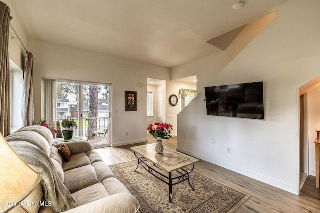 377 E Knotty Pine Ln Unit 2, Coeur Dalene, ID 83815 - living area with wood finished floors and baseboards