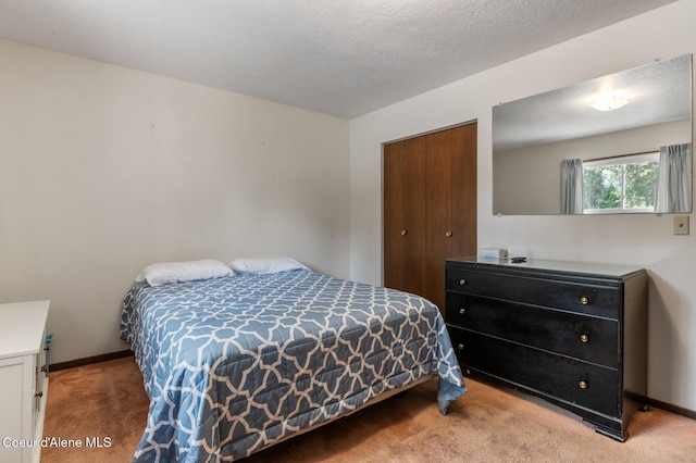 279 S Sequoia Ct, Post Falls, ID 83854 - bedroom with carpet floors, a closet, and baseboards