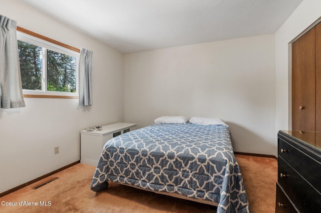 279 S Sequoia Ct, Post Falls, ID 83854 - bedroom with light colored carpet and baseboards