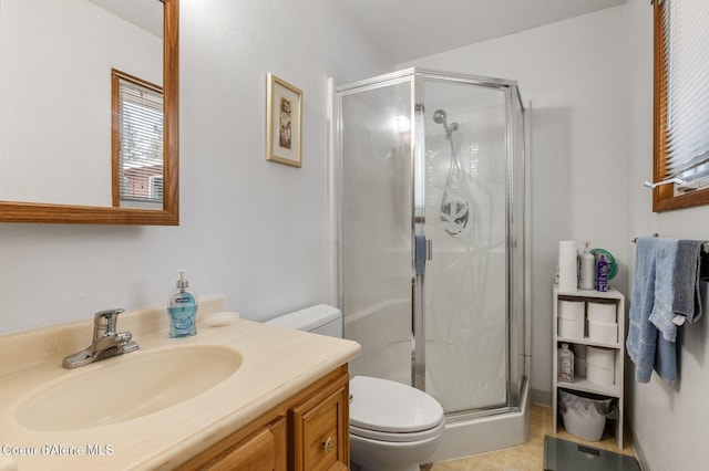 279 S Sequoia Ct, Post Falls, ID 83854 - bathroom featuring a stall shower, toilet, and vanity