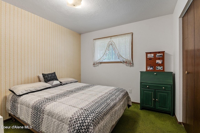 279 S Sequoia Ct, Post Falls, ID 83854 - bedroom featuring dark colored carpet, baseboards, and a closet