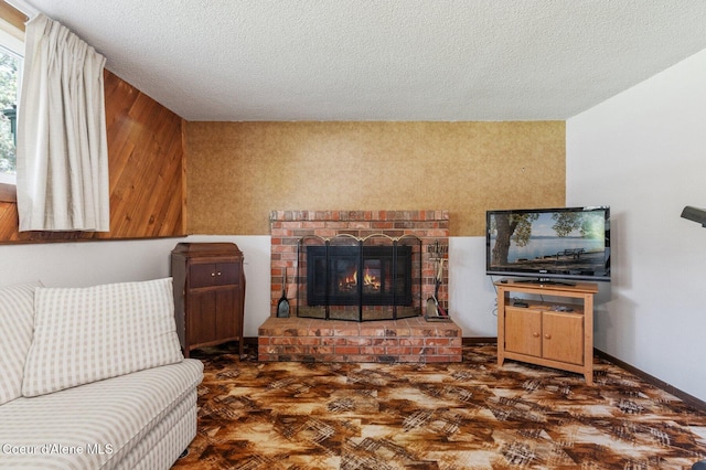 279 S Sequoia Ct, Post Falls, ID 83854 - living room with a fireplace, a textured ceiling, and wood finished floors