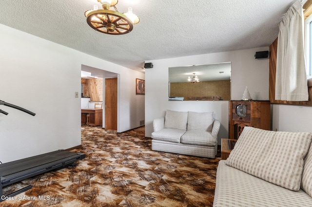 279 S Sequoia Ct, Post Falls, ID 83854 - living area featuring a chandelier and a textured ceiling