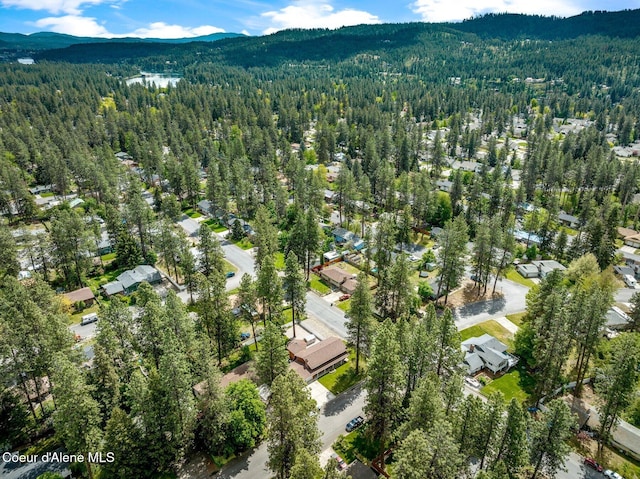 279 S Sequoia Ct, Post Falls, ID 83854 - view of property location featuring a heavily wooded area, a mountainous background, and nearby suburban area