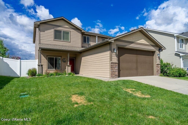 1761 W Pyrenees Loop, Coeur Dalene, ID 83815 - view of front facade with an attached garage, driveway, and stone siding