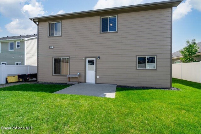 1761 W Pyrenees Loop, Coeur Dalene, ID 83815 - rear view of property with a patio area