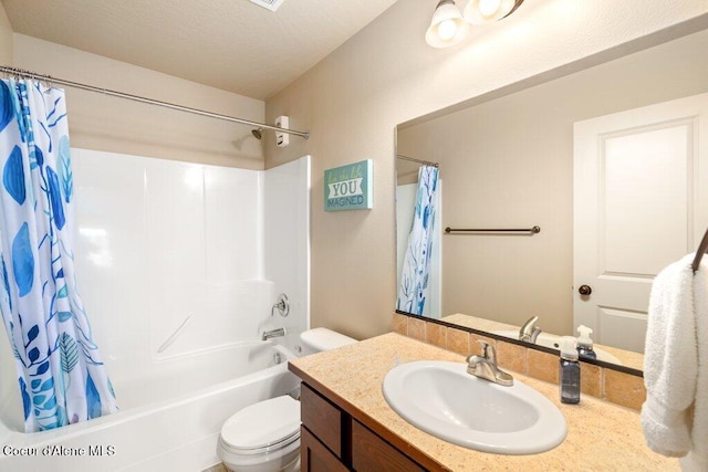 1761 W Pyrenees Loop, Coeur Dalene, ID 83815 - bathroom with toilet, vanity, and shower / bath combo