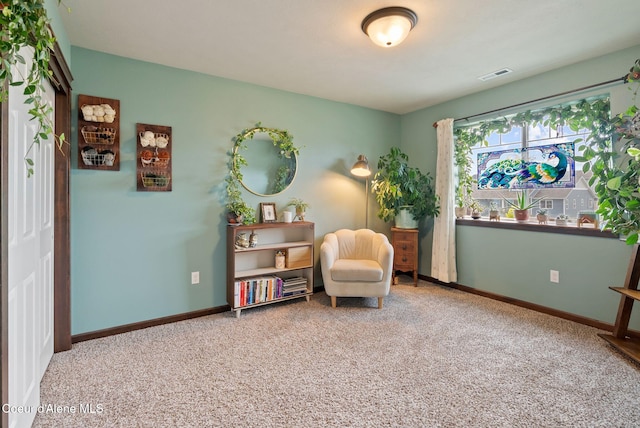 6595 W Covenant St, Rathdrum, ID 83858 - living area featuring carpet floors and baseboards