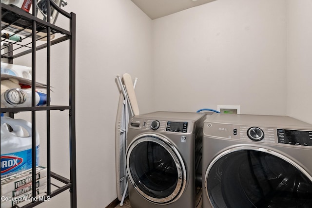 6595 W Covenant St, Rathdrum, ID 83858 - washroom featuring washer and dryer