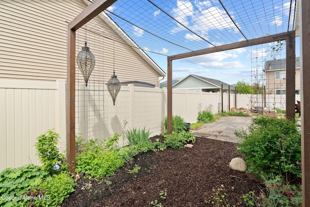 6595 W Covenant St, Rathdrum, ID 83858 - fenced backyard featuring a patio area