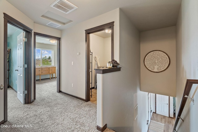 6595 W Covenant St, Rathdrum, ID 83858 - corridor with light carpet and baseboards