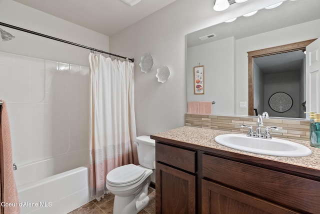 6595 W Covenant St, Rathdrum, ID 83858 - full bathroom with toilet, vanity, shower / bath combo, and tile patterned flooring