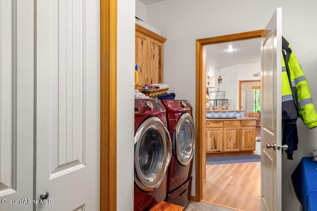 911 French Gulch Rd, Kingston, ID 83839 - laundry area featuring independent washer and dryer and cabinet space