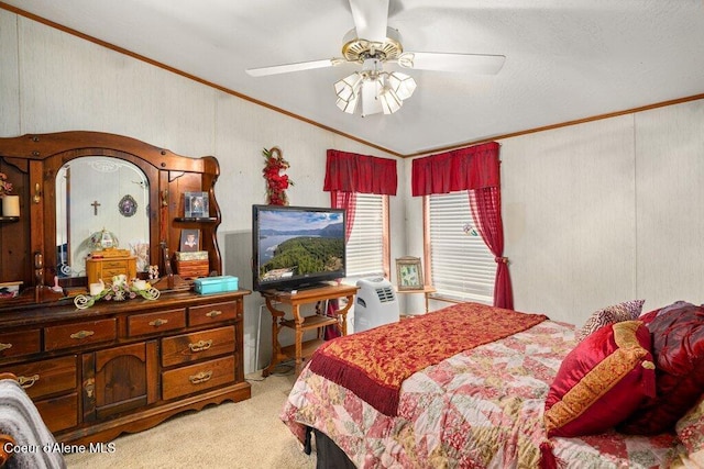 911 French Gulch Rd, Kingston, ID 83839 - bedroom with crown molding, vaulted ceiling, light carpet, and a ceiling fan