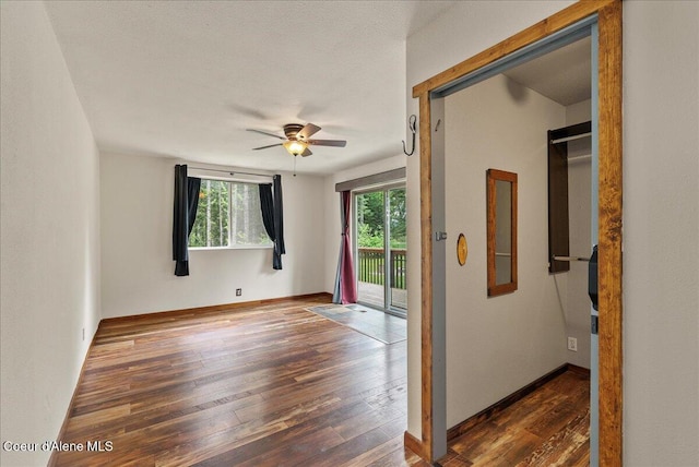 1072 Upland Dr, Sandpoint, ID 83864 - empty room featuring ceiling fan, hardwood / wood-style flooring, and baseboards