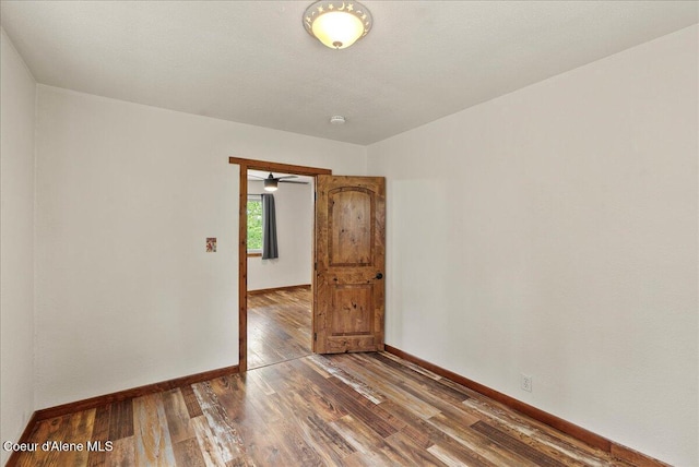 1072 Upland Dr, Sandpoint, ID 83864 - spare room with wood finished floors, baseboards, and a smoke detector