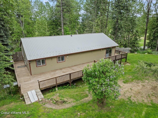1072 Upland Dr, Sandpoint, ID 83864 - view of property exterior with a deck and metal roof