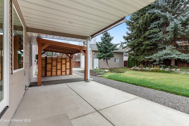 5519 N Wade St, Coeur Dalene, ID 83815 - view of patio / terrace with an outbuilding