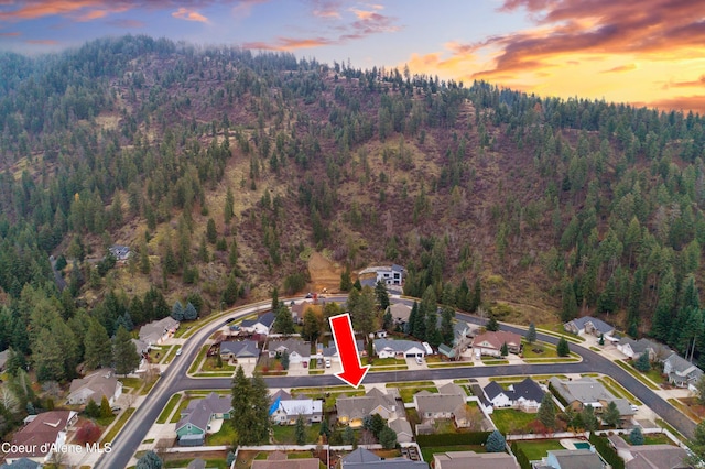 5519 N Wade St, Coeur Dalene, ID 83815 - aerial view at dusk of a forest view and a residential view