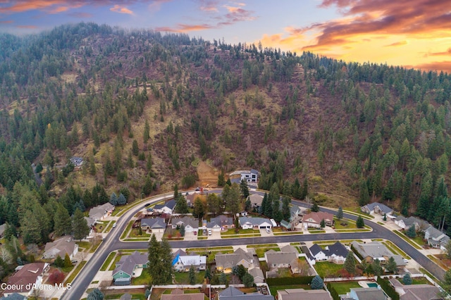 5519 N Wade St, Coeur Dalene, ID 83815 - view of property location with a heavily wooded area and nearby suburban area