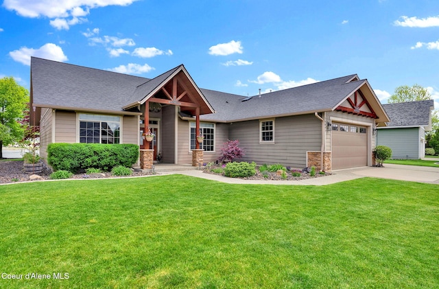 14097 N Pristine Cir, Rathdrum, ID 83858 - craftsman-style house with a front yard, concrete driveway, an attached garage, and roof with shingles