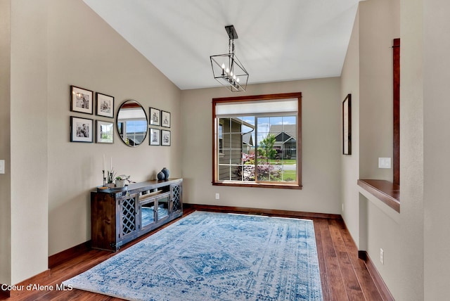 14097 N Pristine Cir, Rathdrum, ID 83858 - dining space with wood finished floors, a chandelier, and baseboards