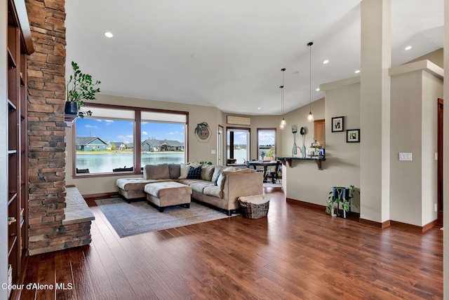14097 N Pristine Cir, Rathdrum, ID 83858 - living room with dark wood-type flooring, baseboards, and recessed lighting