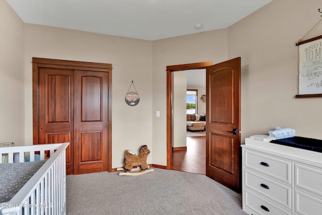 14097 N Pristine Cir, Rathdrum, ID 83858 - bedroom featuring carpet and baseboards
