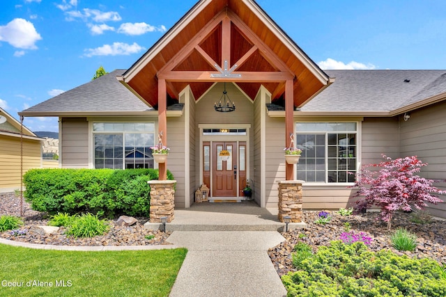 14097 N Pristine Cir, Rathdrum, ID 83858 - doorway to property with a shingled roof