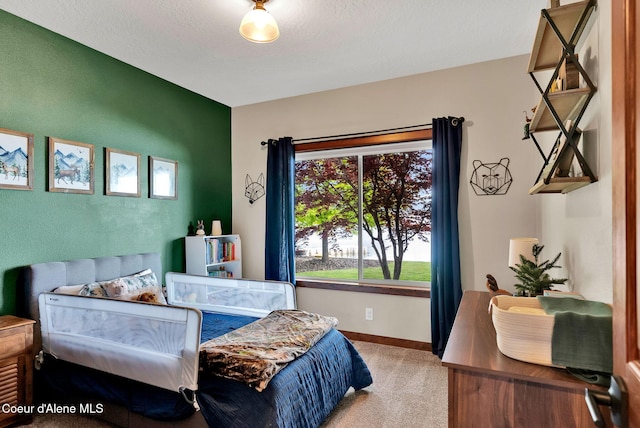 14097 N Pristine Cir, Rathdrum, ID 83858 - carpeted bedroom with baseboards