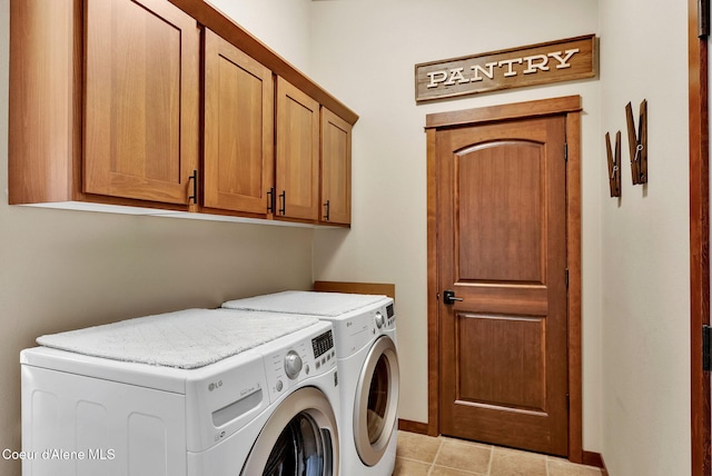 14097 N Pristine Cir, Rathdrum, ID 83858 - washroom featuring cabinet space, independent washer and dryer, baseboards, and light tile patterned floors