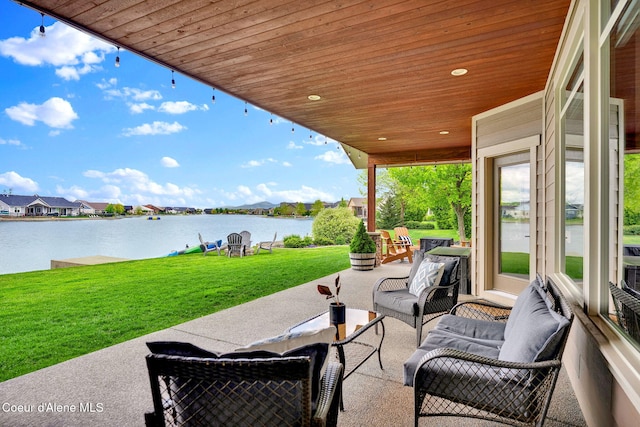 14097 N Pristine Cir, Rathdrum, ID 83858 - view of patio featuring a water view and an outdoor hangout area