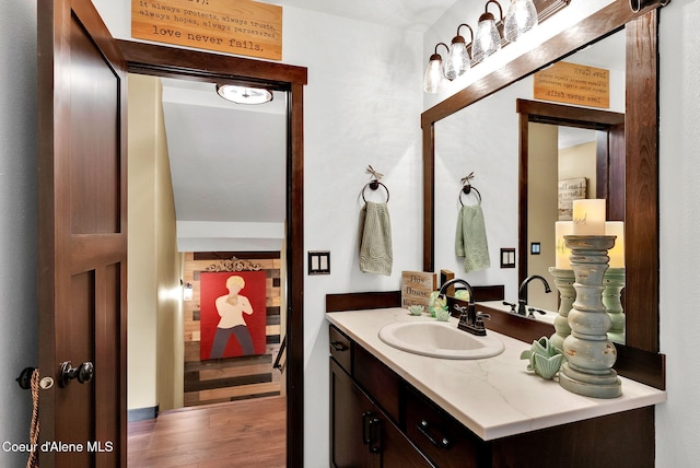 17940 W Sheltered Ct, Hauser, ID 83854 - bathroom with vanity and wood finished floors