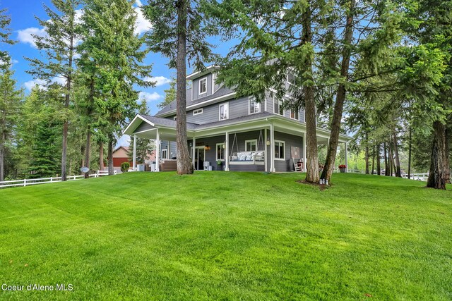 17940 W Sheltered Ct, Hauser, ID 83854 - view of front of property with a porch