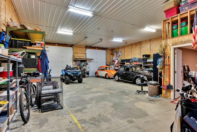 17940 W Sheltered Ct, Hauser, ID 83854 - garage featuring a workshop area