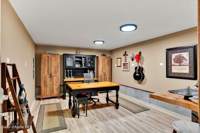 17940 W Sheltered Ct, Hauser, ID 83854 - office space with light wood-style floors and baseboards
