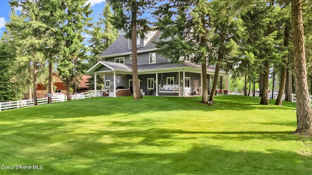 17940 W Sheltered Ct, Hauser, ID 83854 - back of house with roof with shingles