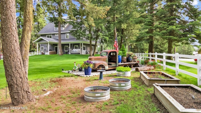 17940 W Sheltered Ct, Hauser, ID 83854 - view of yard featuring a vegetable garden