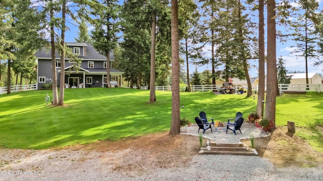 17940 W Sheltered Ct, Hauser, ID 83854 - view of yard with a fire pit and a patio