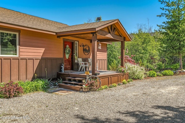 603 Schneiders Rd, Sagle, ID 83860 - view of front of home with roof with shingles and a porch