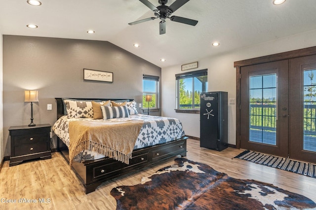 603 Schneiders Rd, Sagle, ID 83860 - bedroom featuring access to exterior, lofted ceiling, light wood finished floors, recessed lighting, and french doors